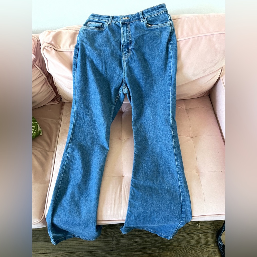 Flared jeans with rainbow design pockets